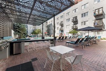 Poolside kitchen and alfresco dining space